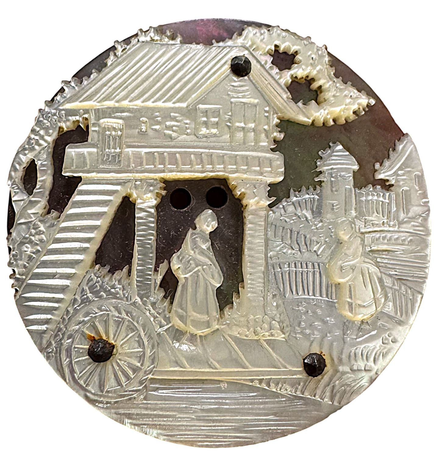 An extraordinary carved pearl button!