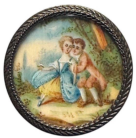 A charming hand painted colorful young couple under glass button!
