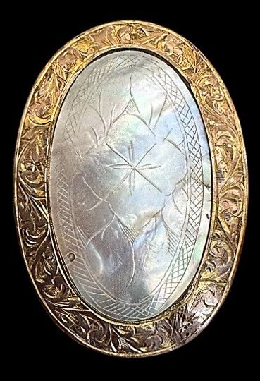 A large oval 19th century engraved pearl in metal button!