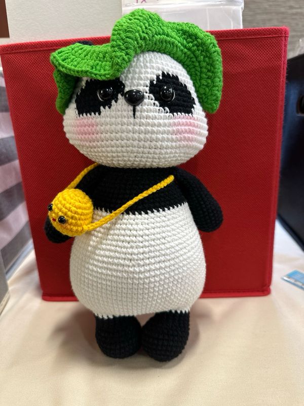 Panda Wears Lotus Leaf.