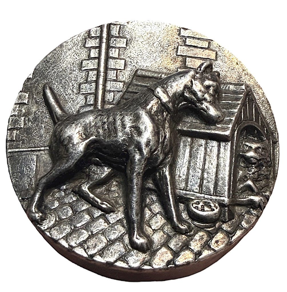 An early 20th century high relief silvered dog button!