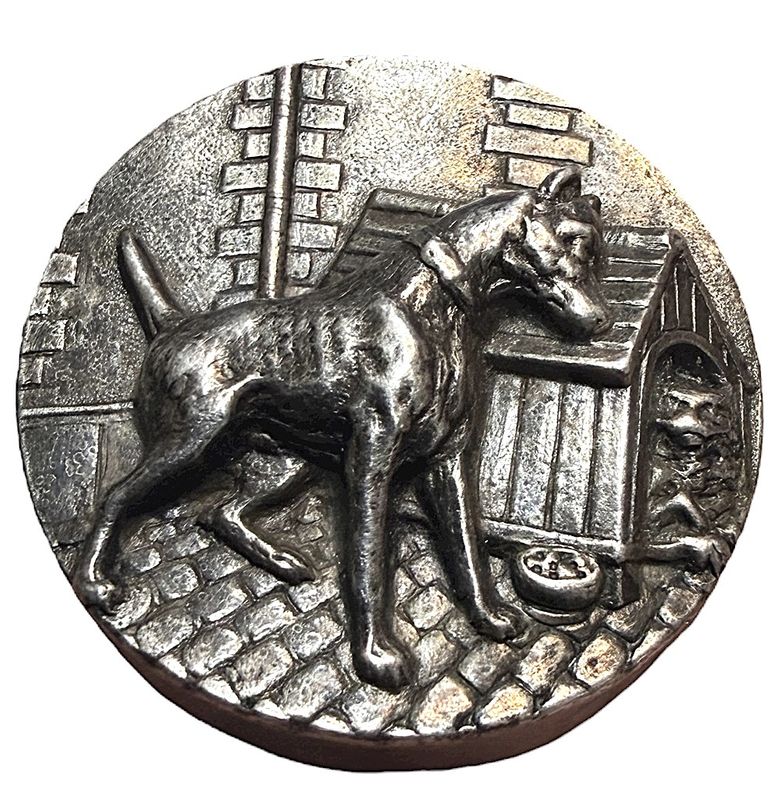 An early 20th century high relief silvered dog button!