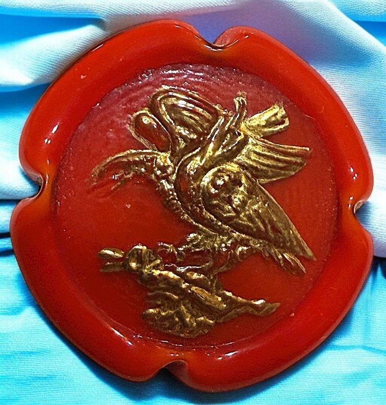 A scarce color Bimini glass pictorial button.