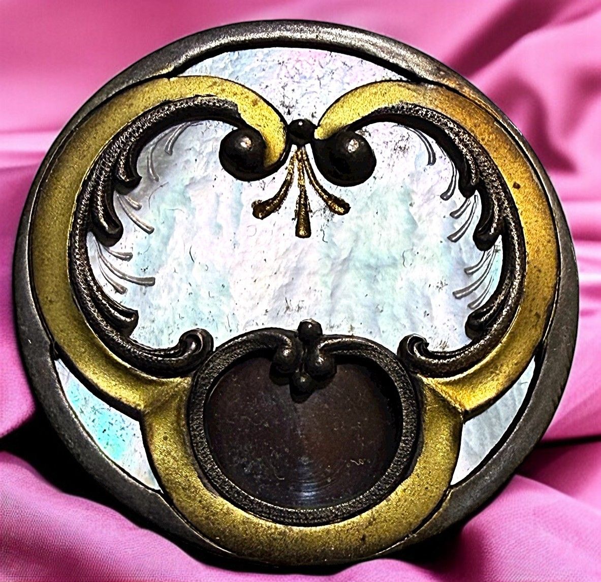 A beautiful large Art Nouveau pearl in metal button.