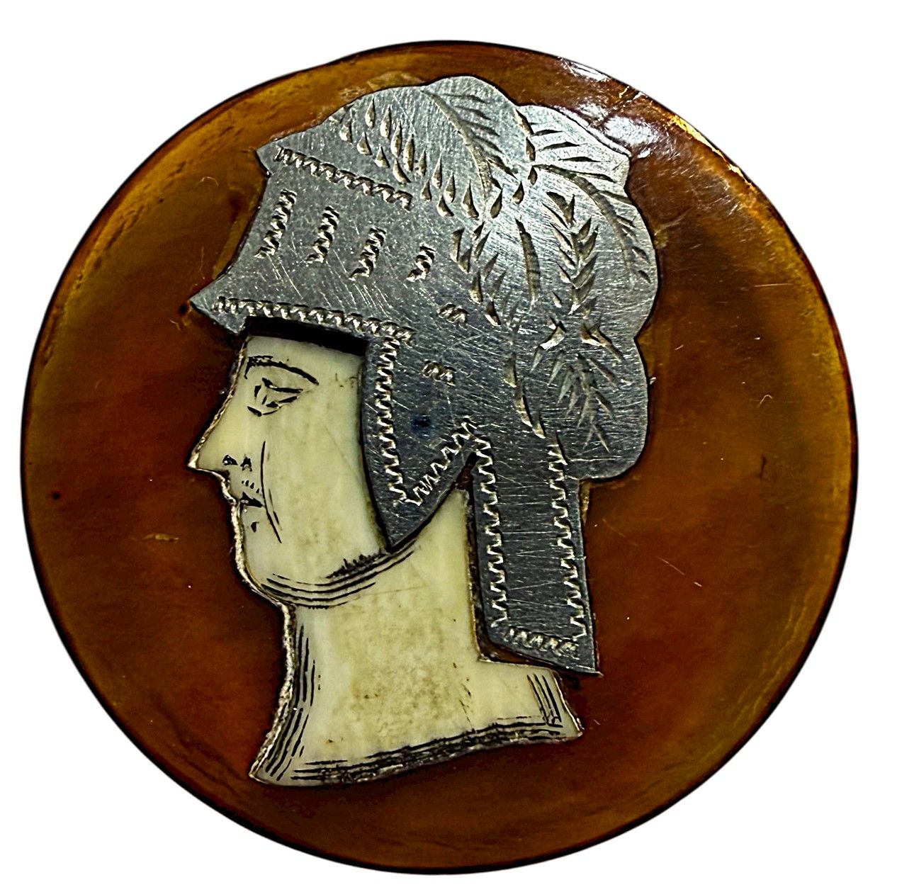 A scarce inlayed and overlayed natural horn button.