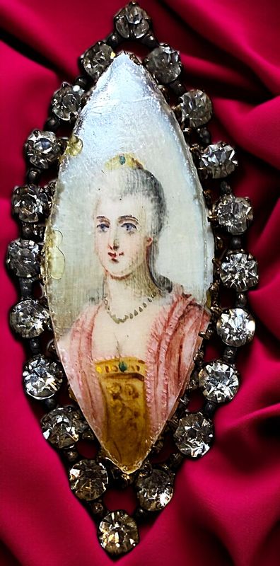 A rare large spindle shape hand painted under glass buttons=!