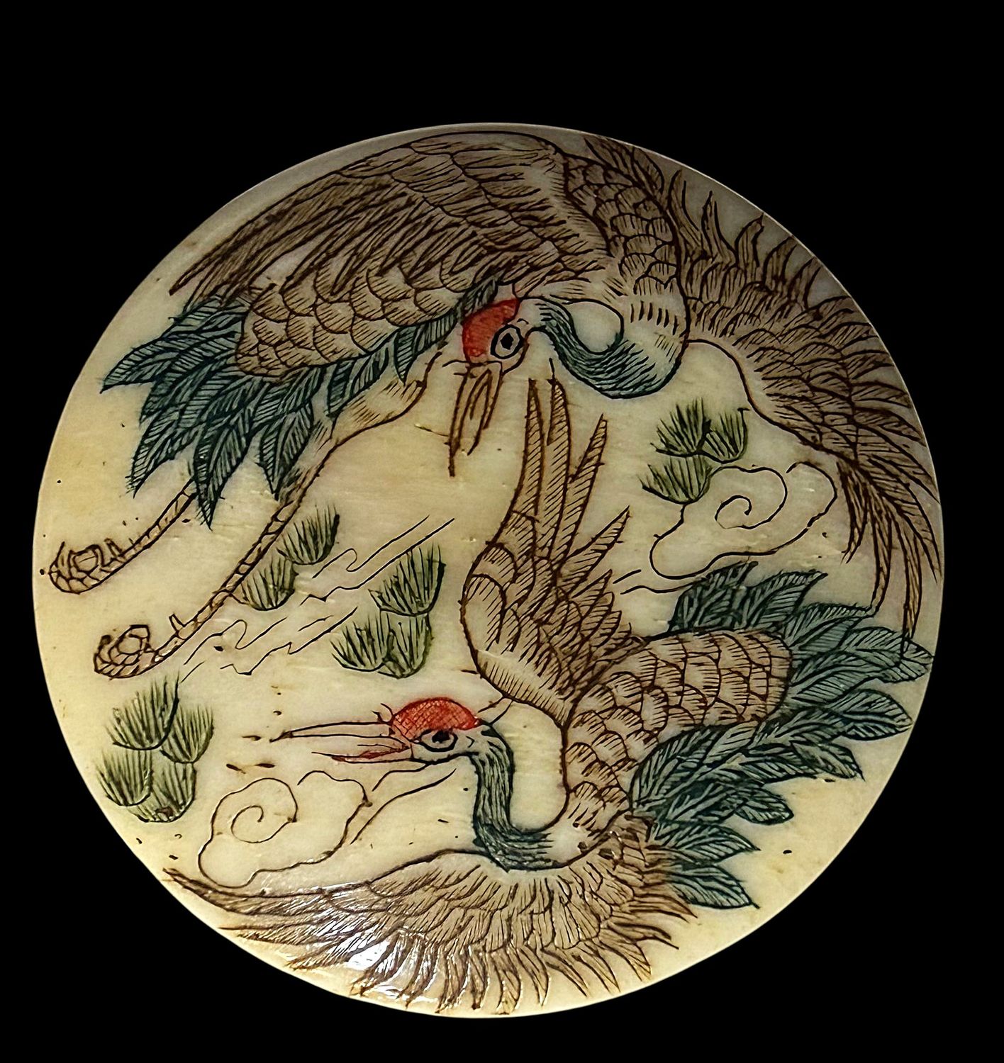 A 20TH CENTURY BONE ENAGRAVED AND COILORFUL BIRDS 1  3/16"