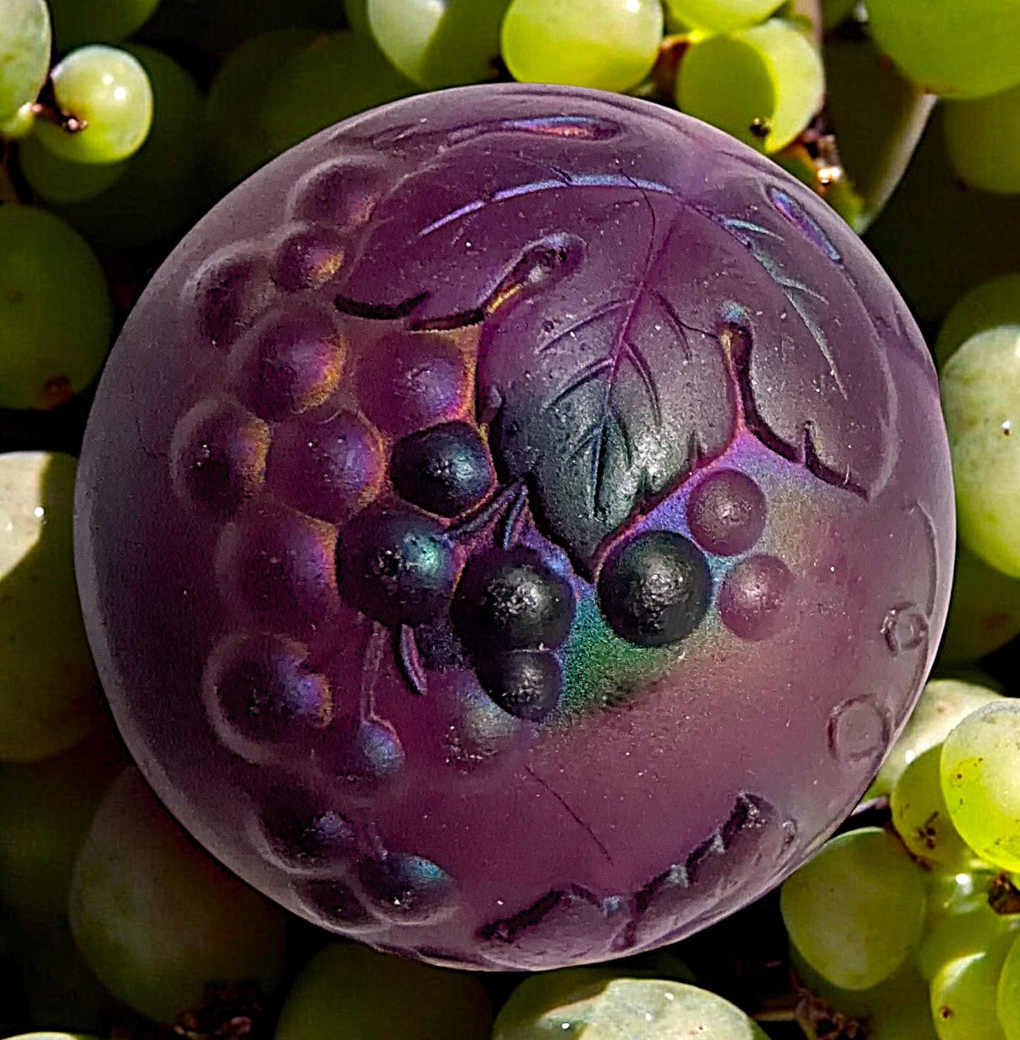 A beautiful colored glass grapes button!