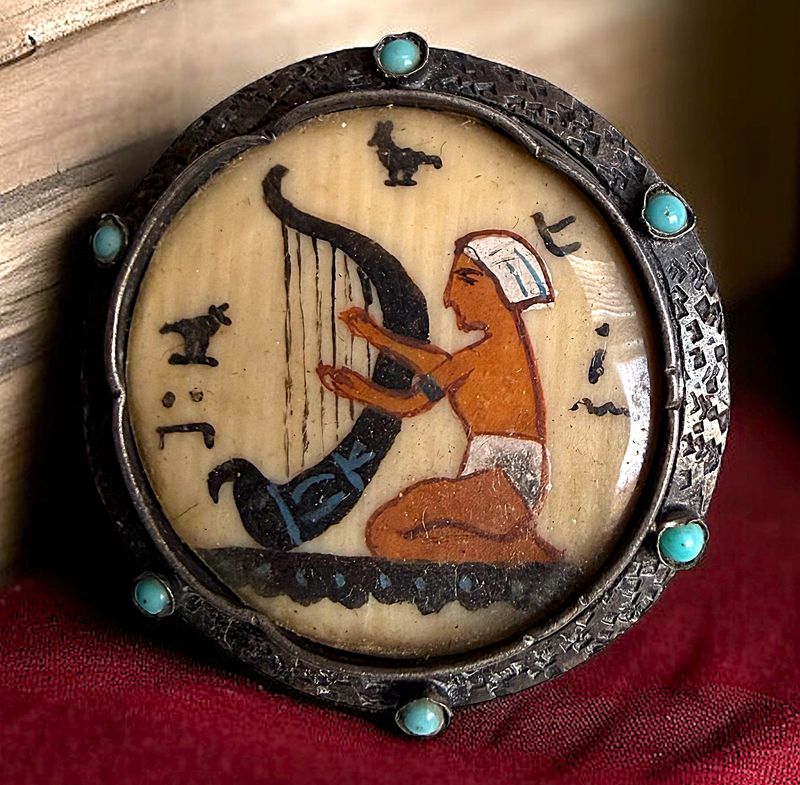 A detailed and beautiful painting under glass button!