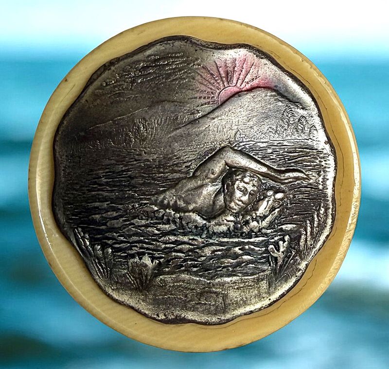 A very Rare pictorial celluloid button!