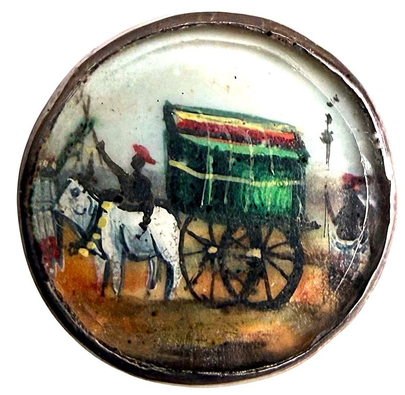 An incredible hand painted under glass pictorial button!