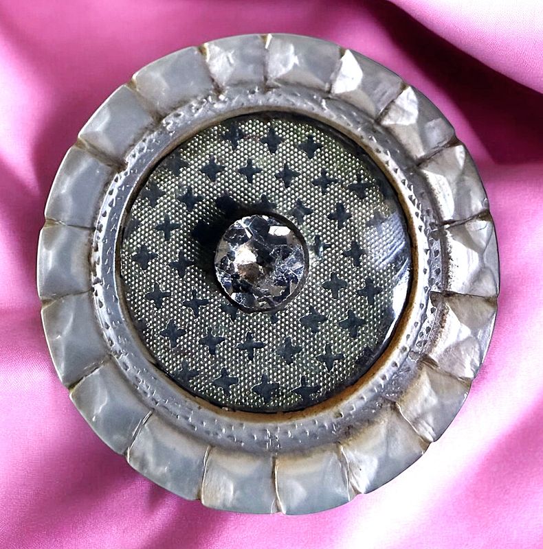 An exquisite 18th century under glass and pearl button!