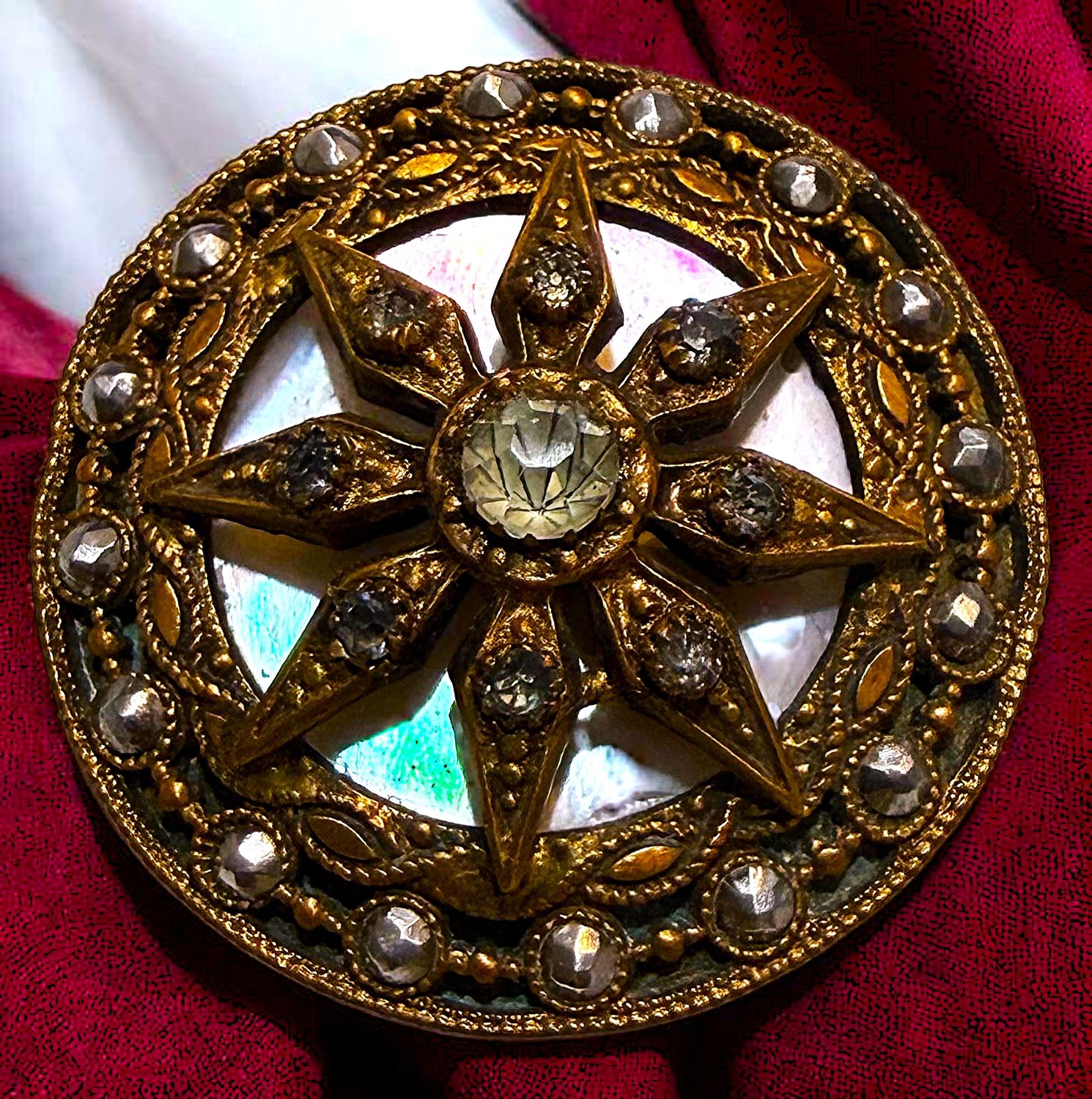 A beautiful division one large pearl background 4 material button!