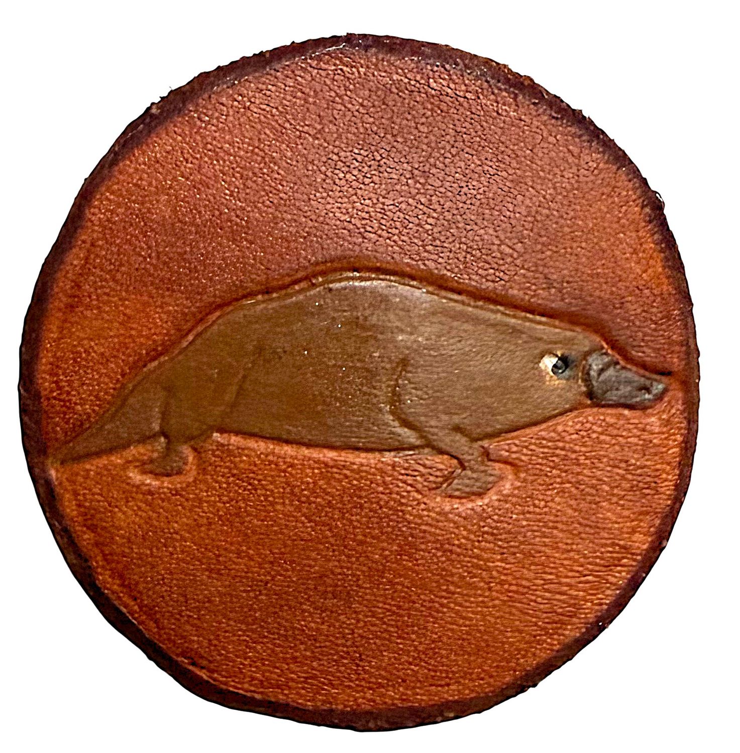 A LATE 20TH CENTURY TOOLED LEATHER STUDIO ARTIST BUTTON