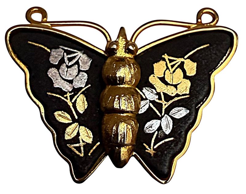A MID 20TH CENTURY DAMASCENE BUTTERFLY BUTTON