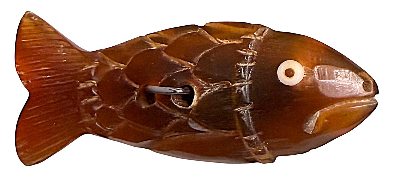 A LArge carved horn realistic fish button