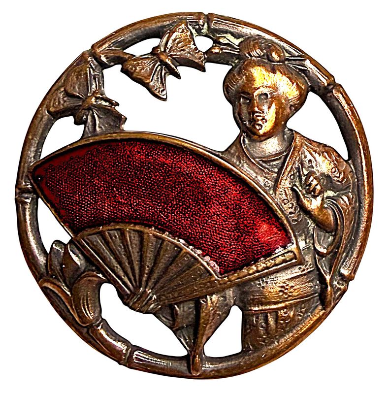 A DIVISION ONE PIERCED AND ENAMEL PICTORIAL BUTTON