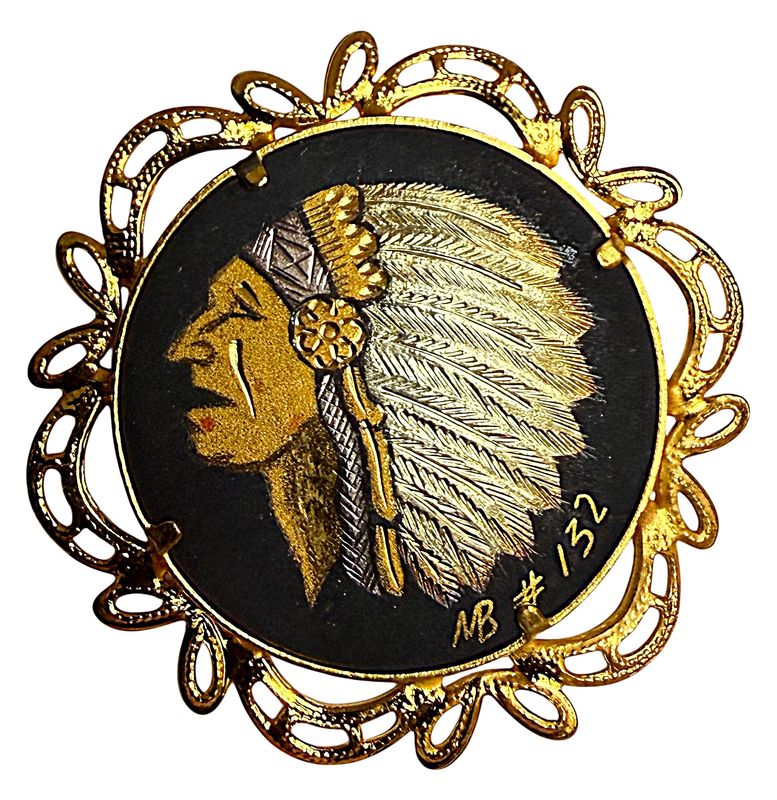 A LARGE STUDIO ARTIST DAMSCENE BUTTON