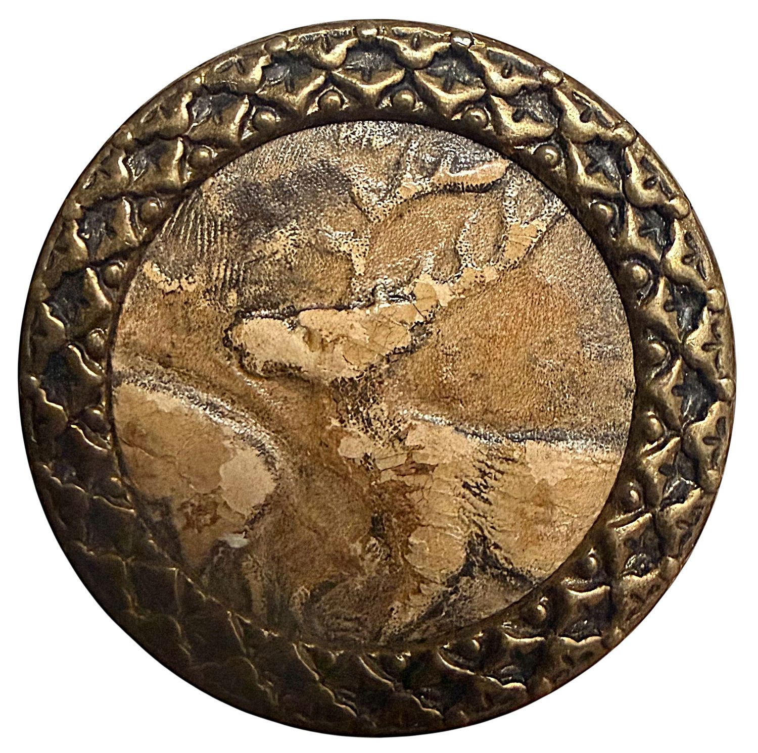 A large 19th C. embossed leather pictorial button