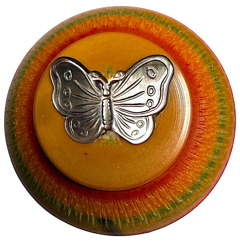 A LARGE SIZE BOB BENSON VEGETABLE IVORY BUTTON