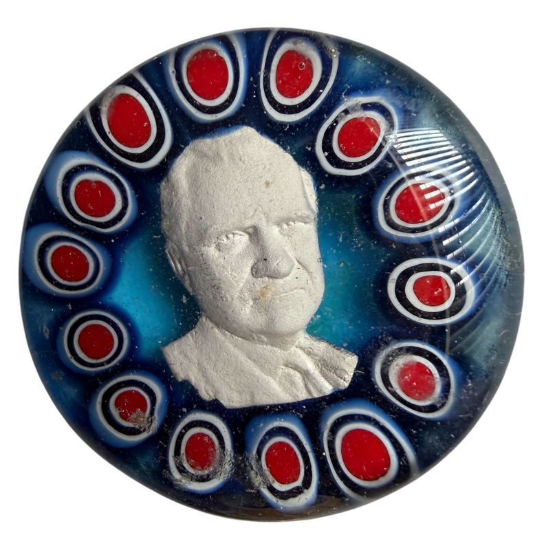 An uncommon size sulphide paperweight glass button