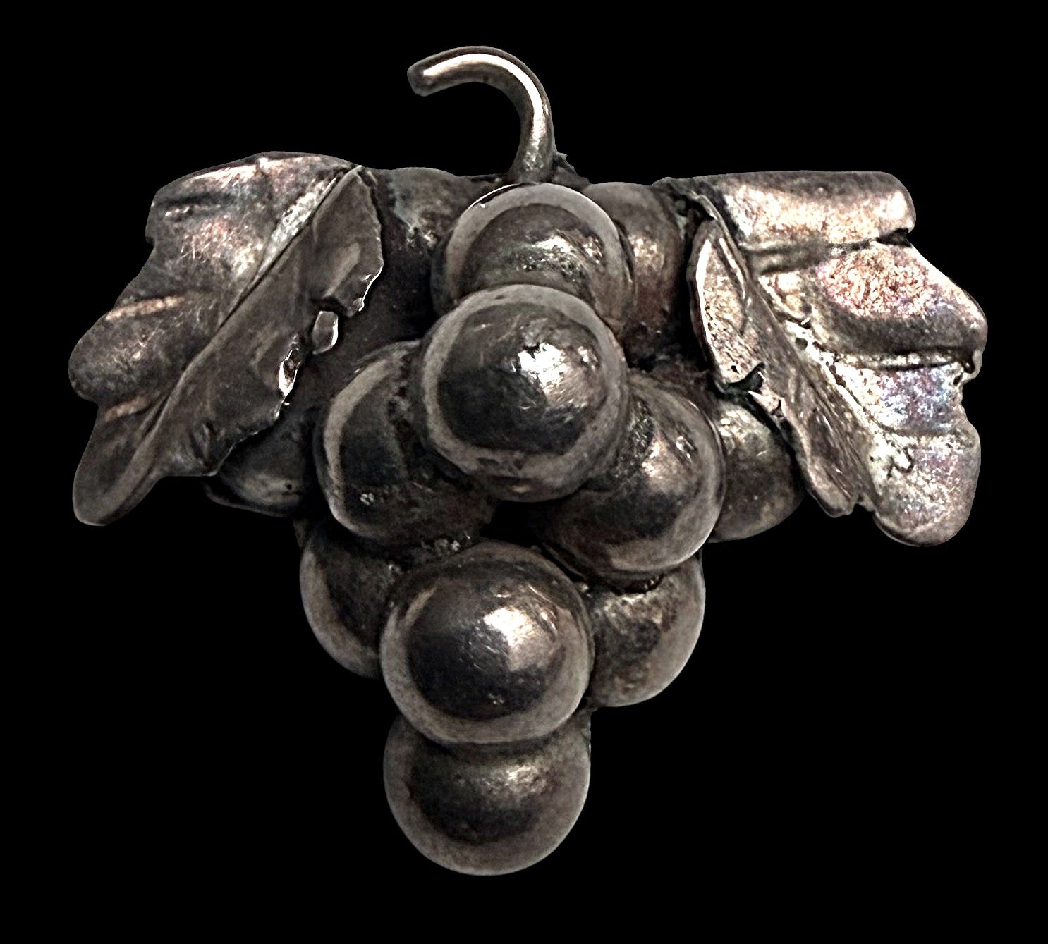 A medium size realistic Mexican silver button