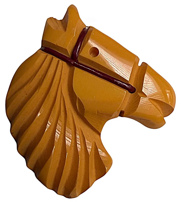 A large realistic chunky Bakelite Horse head button