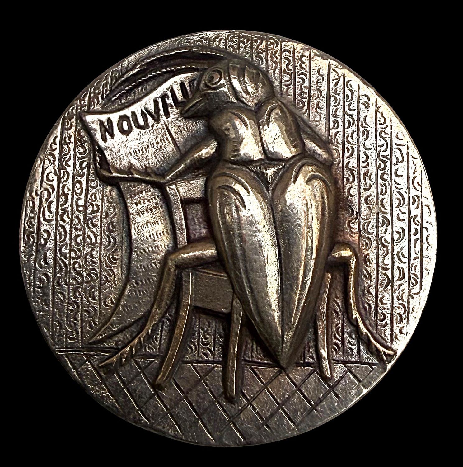 A fun division one insect silvered brass button