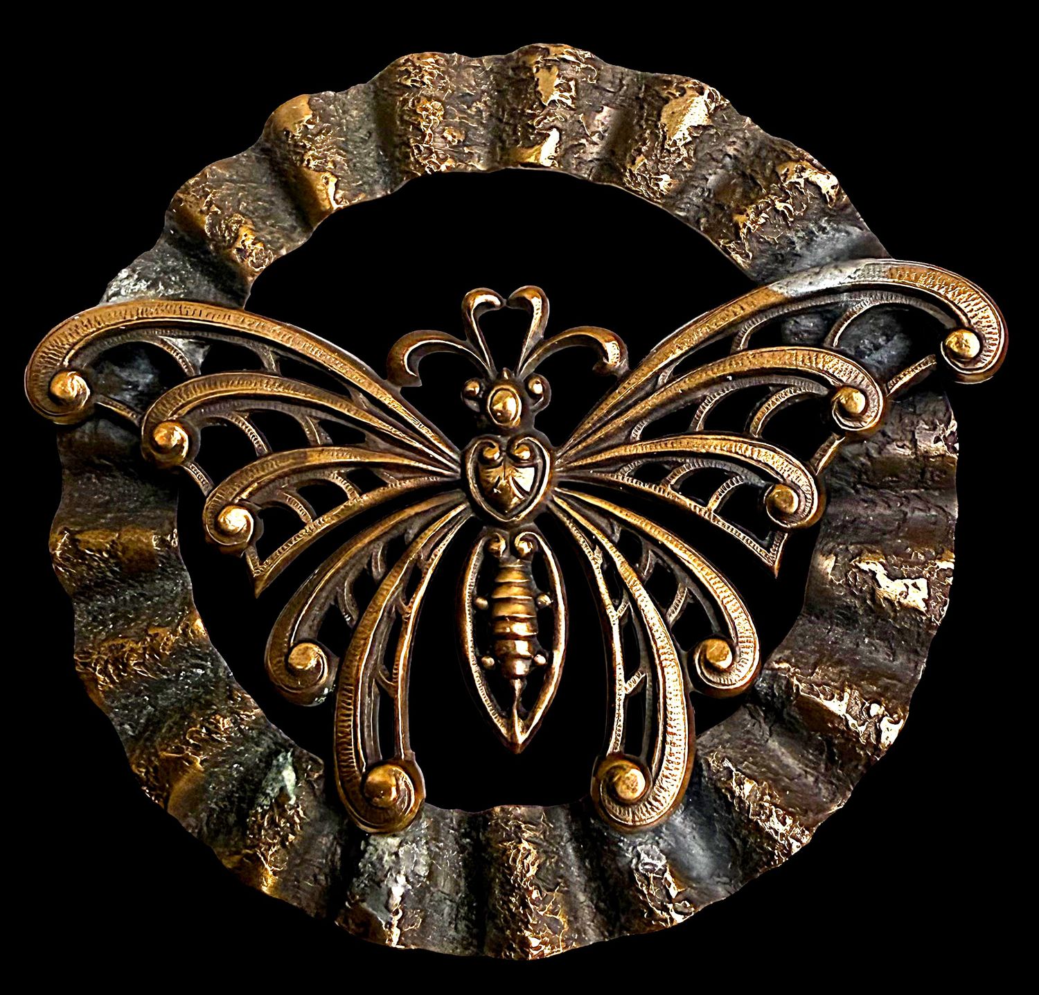 An extra-large division one pierced brass butterfly button