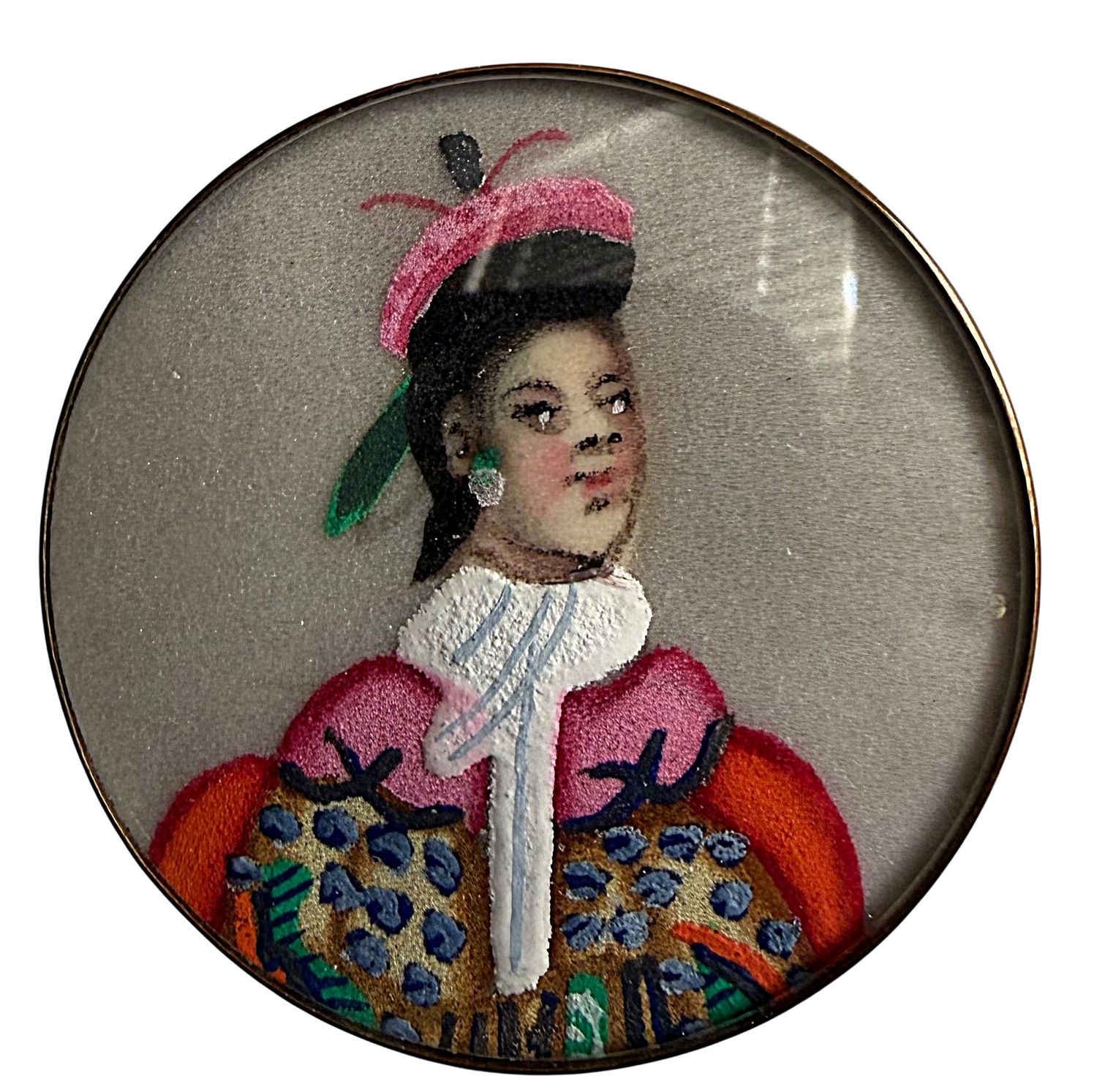 A large division one hand painting under glass button