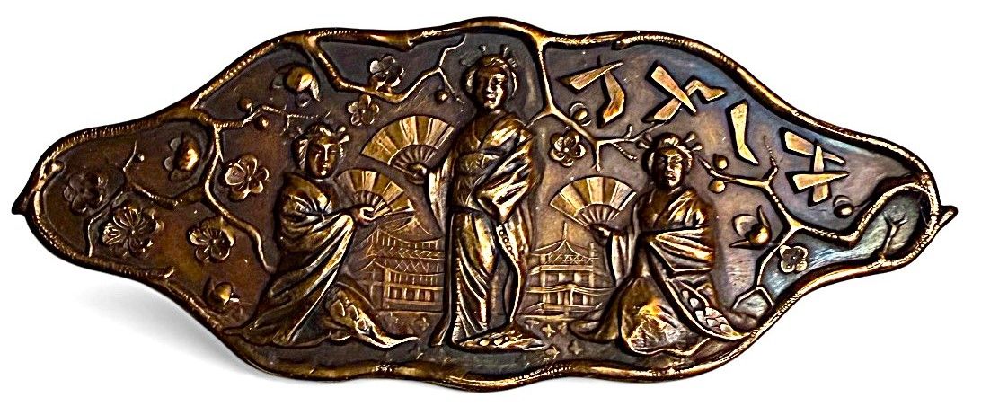 AN UNUSUAL SHAPED DIVISION ONE PICTORIAL ASIAN THEMED BUTTON