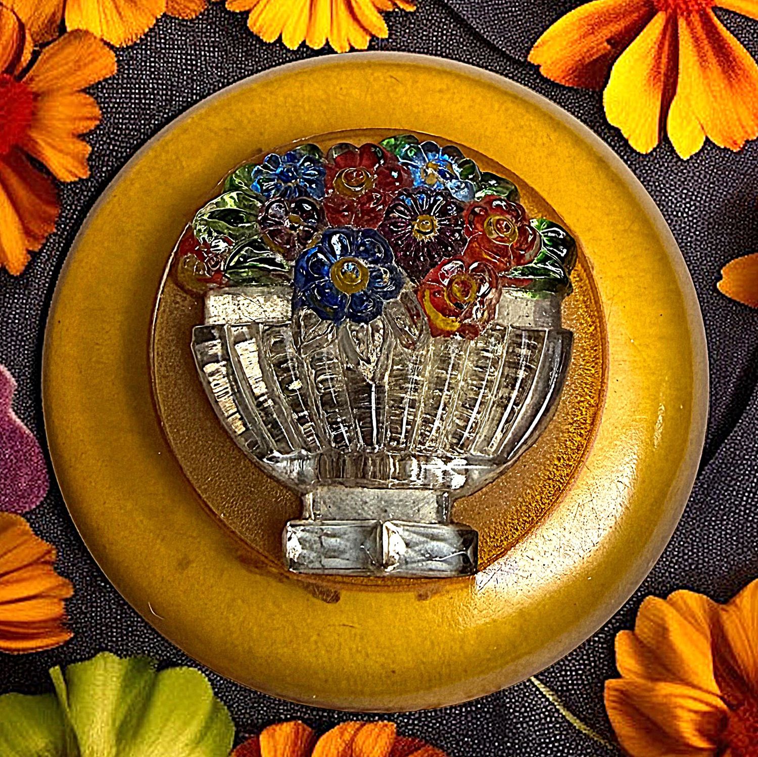 A beautiful and unusual 1940's Bakelite and glass Basket Button