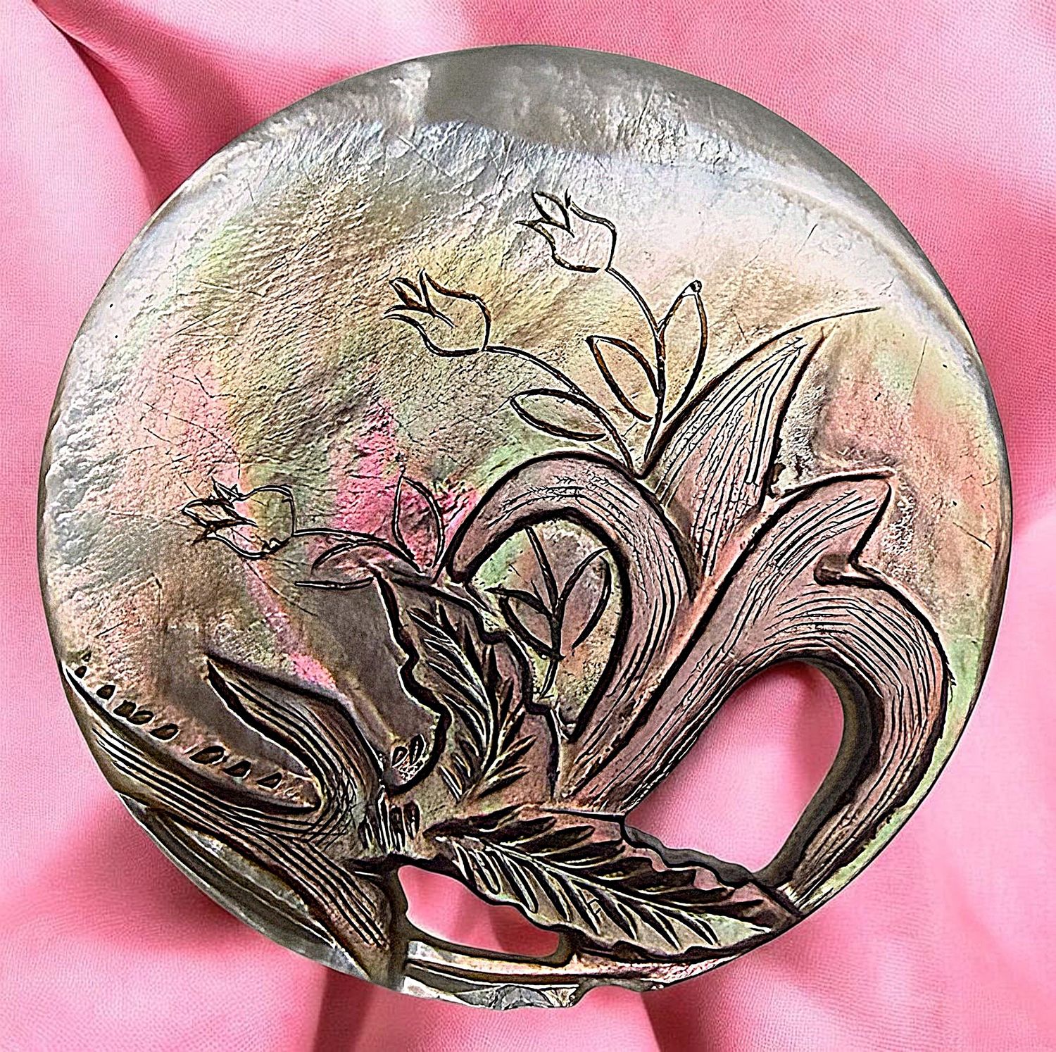 A BEAUTIFUL LARGE DIVISION ONE PIERCED PEARL BUTTON