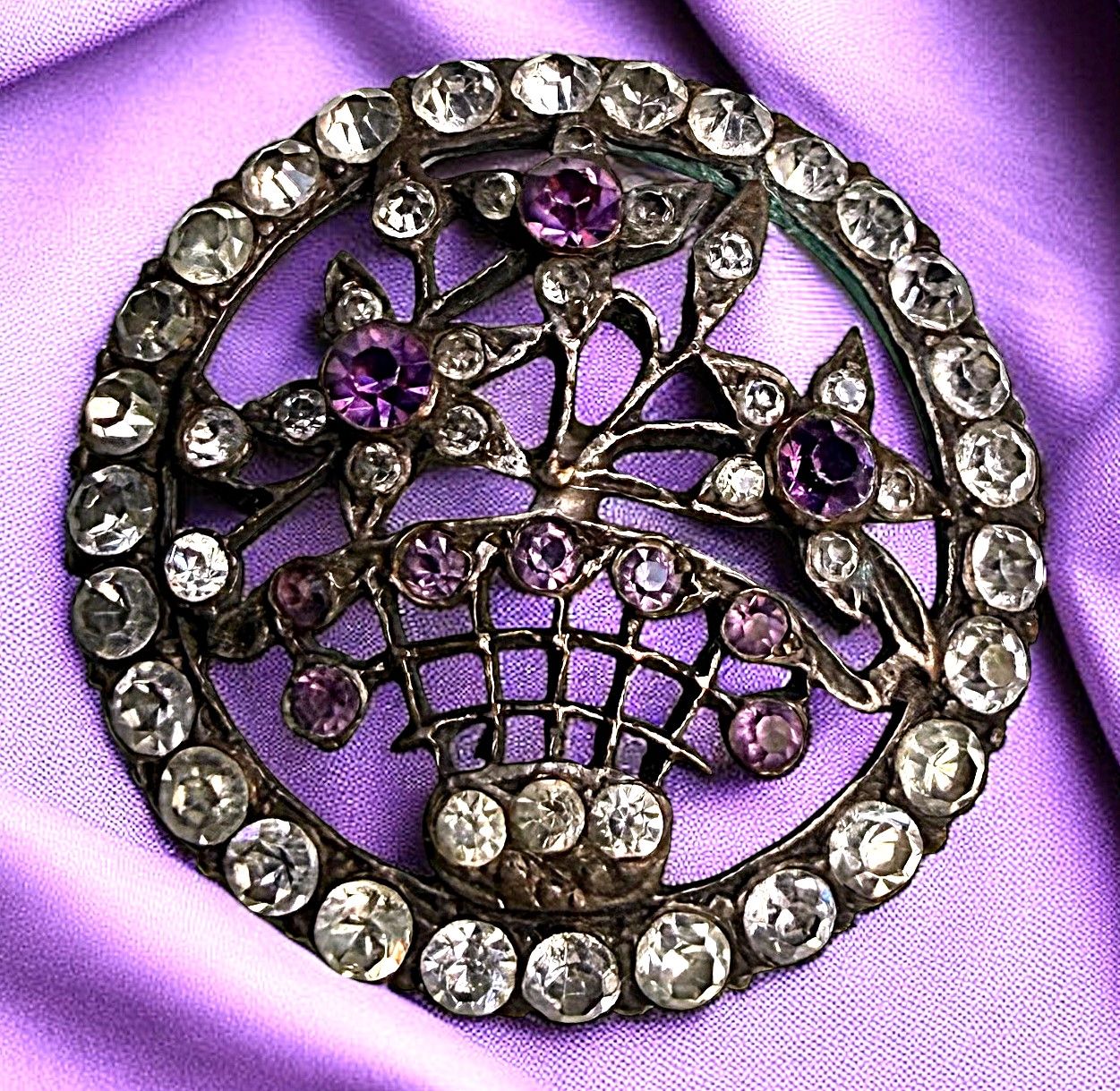 A striking division one jeweled basket button