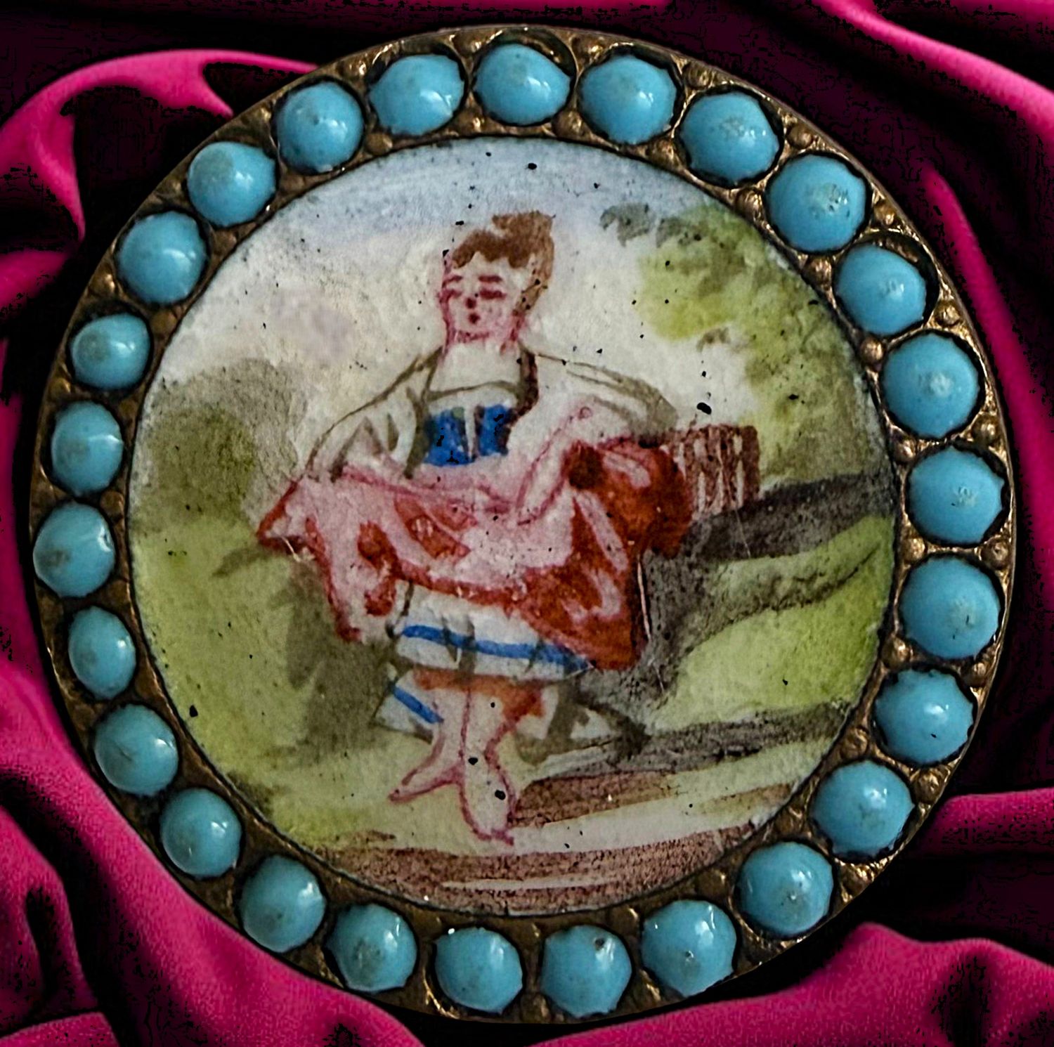A division one figural enamel button