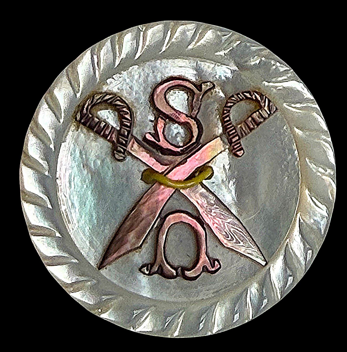 An unusual carved smokey and white pearl from the 19th century