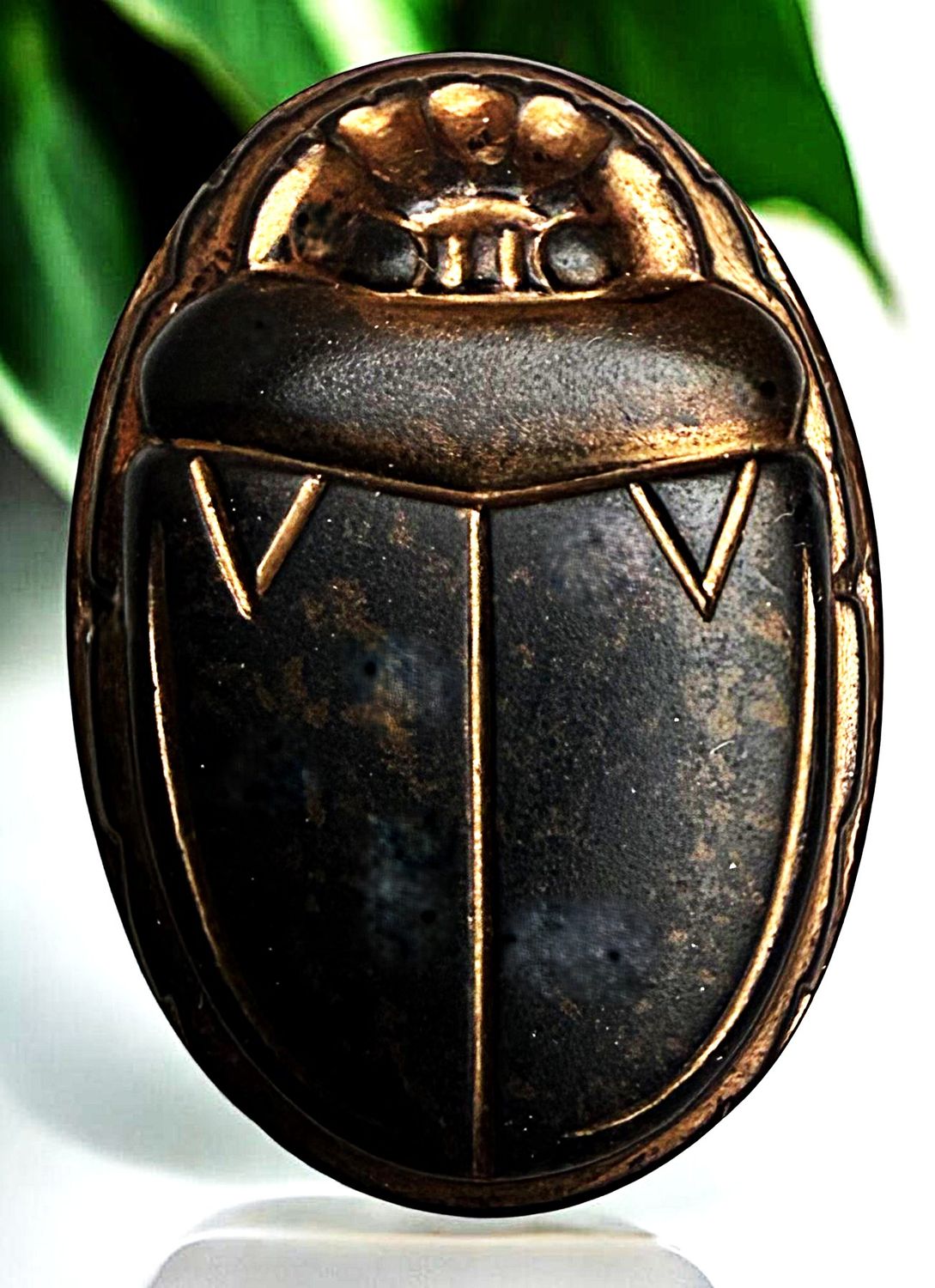 a Division one medium size black glass beetle/Scarab.