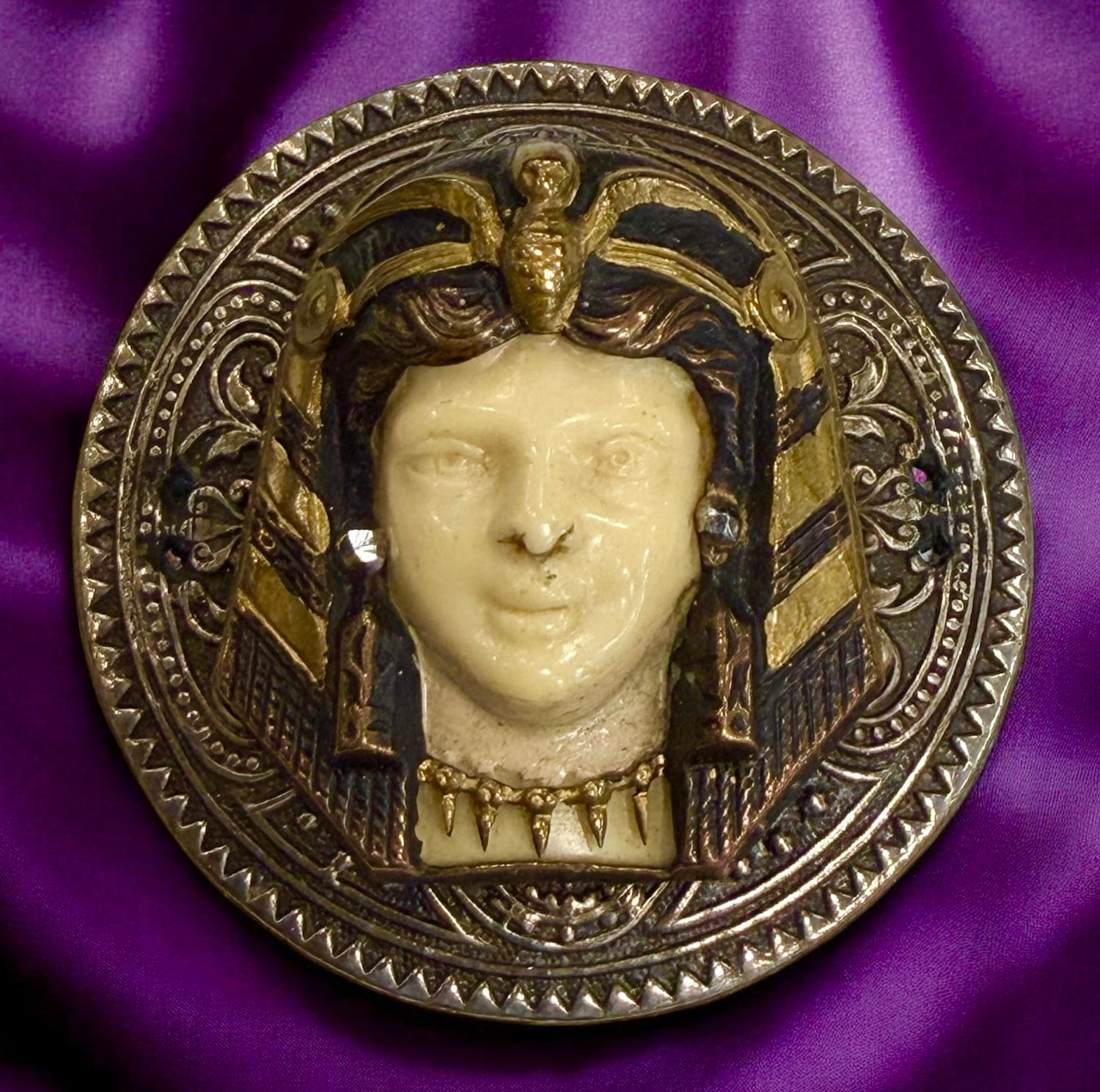 A magnificent high relief Ivoroid Egyptian button!