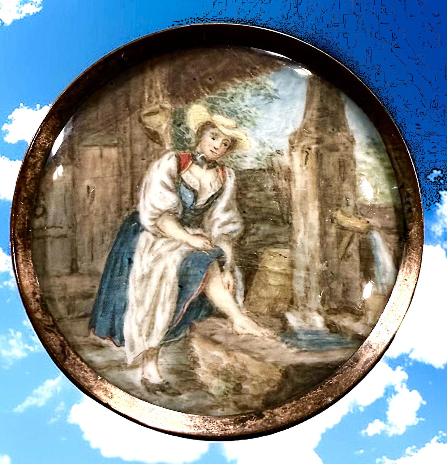A detailed 18th century under glass button!