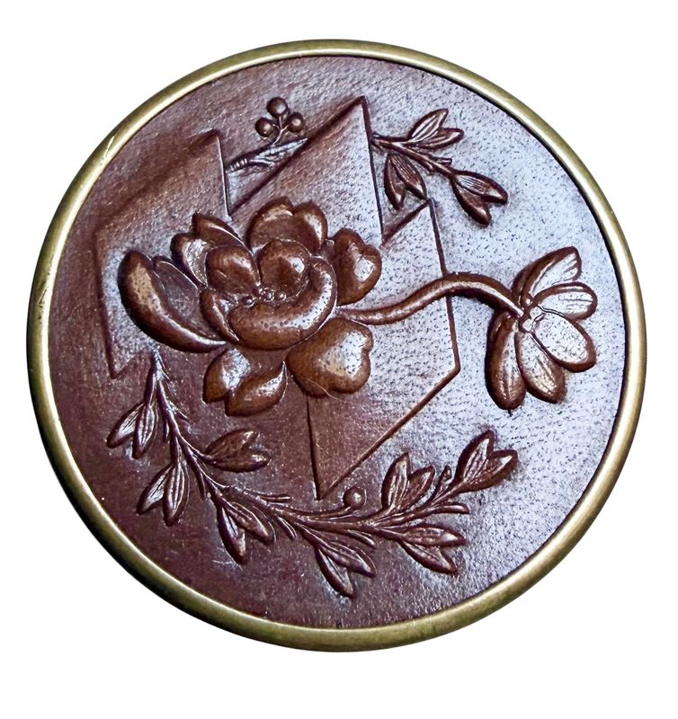 A division one embossed leather pictorial in metal!
