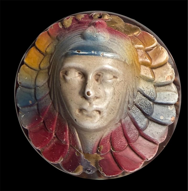 An uusual and high relief 1 Piece 30's Celluloid button