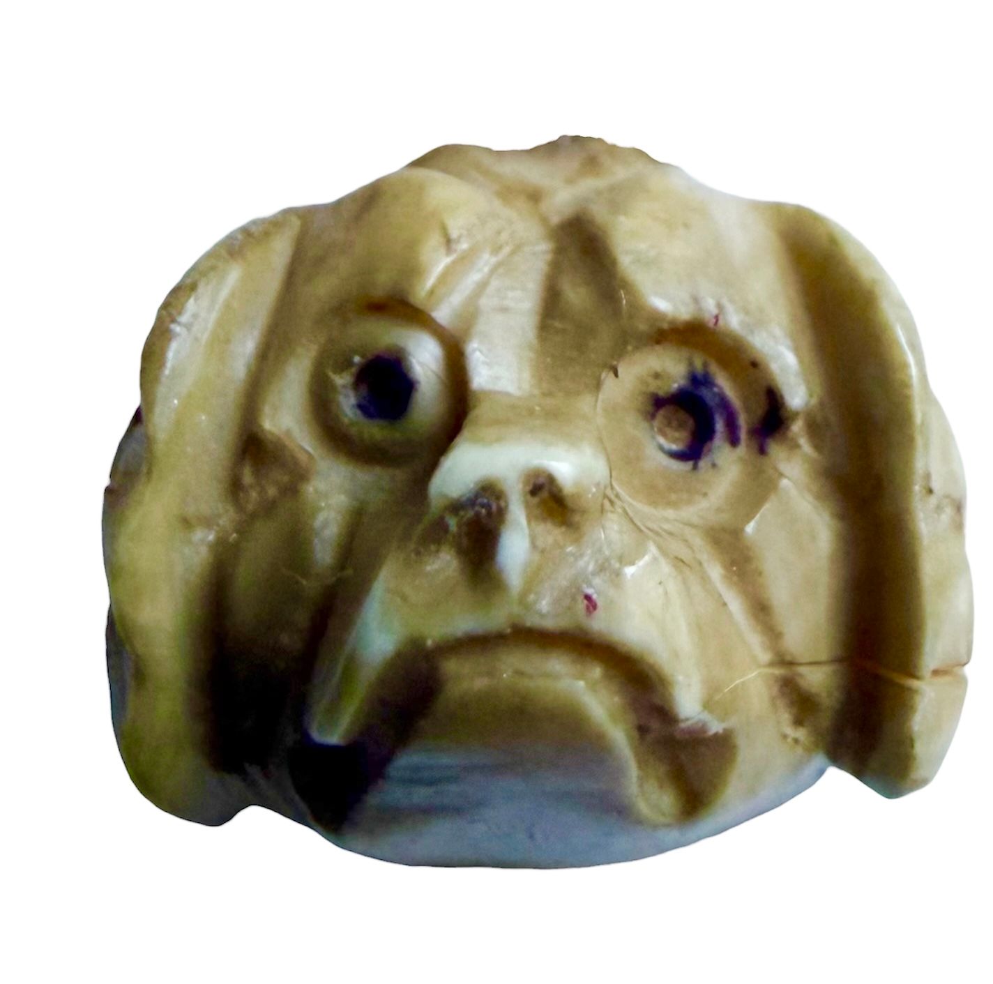 A detailed realistic shaped dog head button!