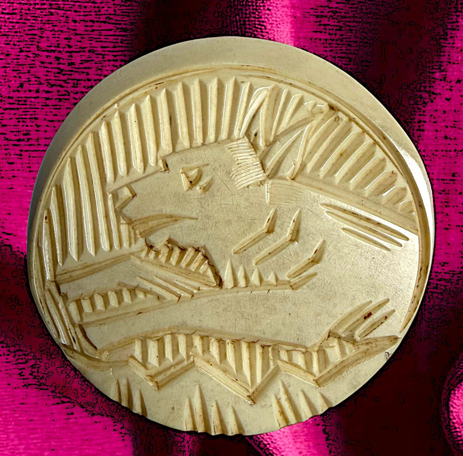 A great thick low relief carved Casein Pictorial Button!