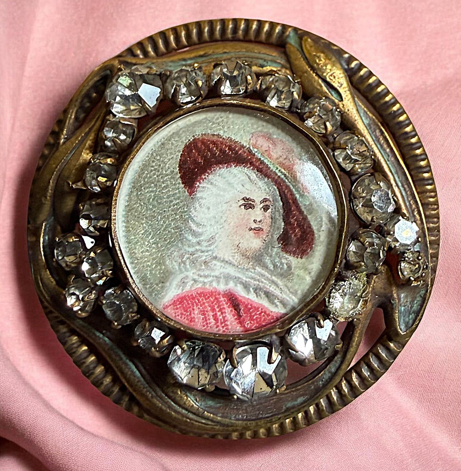 A lovely 19th century lithi under domed glass button!