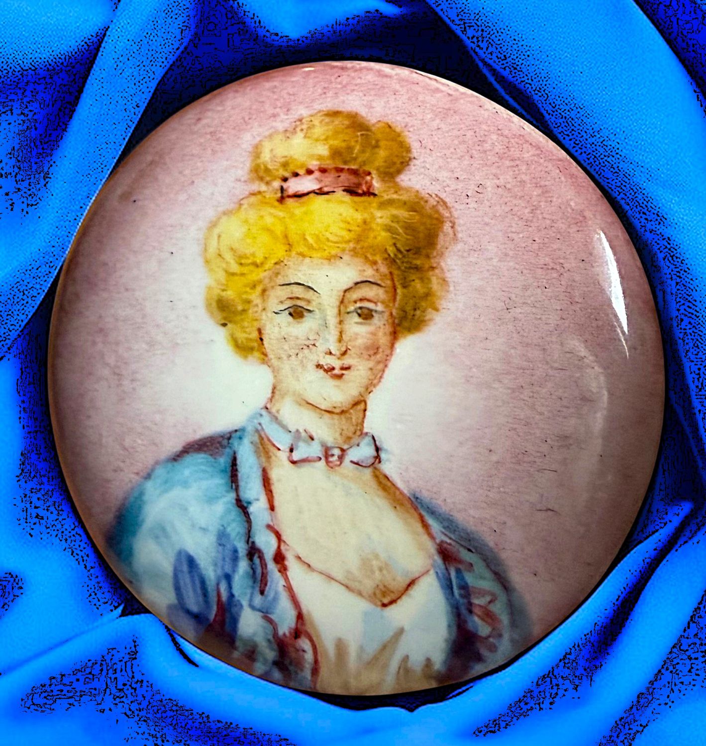 A beautiful 19th century pink and blue enamel figural button!