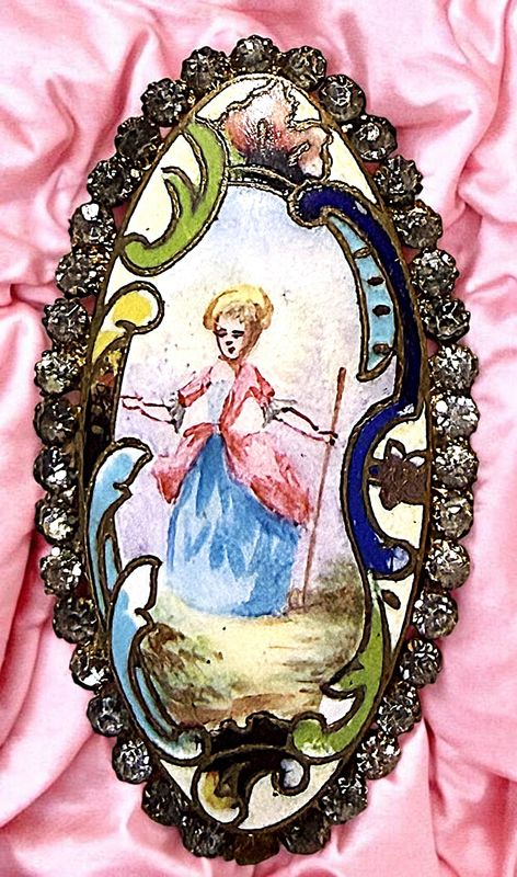 ​A magnificent multi bordered enamel shaped figural button