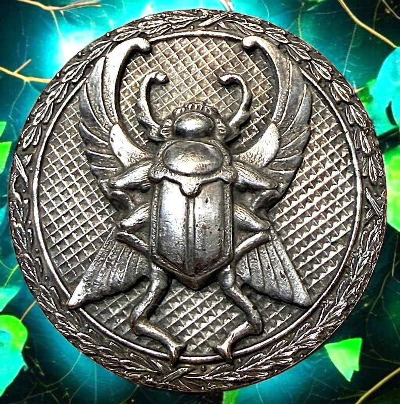 A very detailed and designed large silver Scarab button!