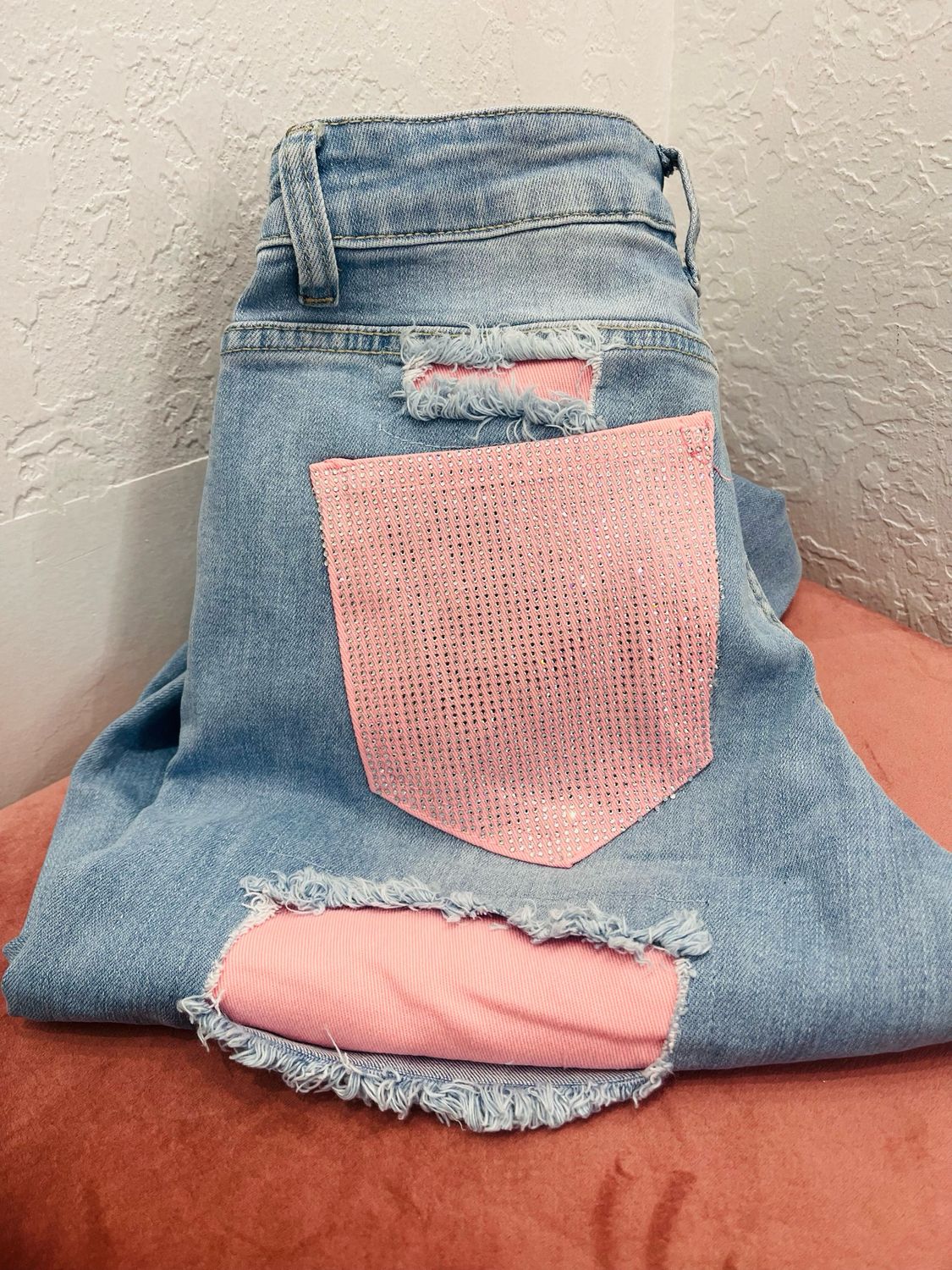 Jeans tasca rosa elasticizzato