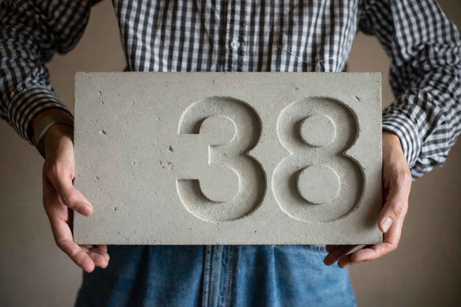 house number in concrete – custom door sign