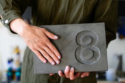 house number in anthracite concrete. custom door sign
